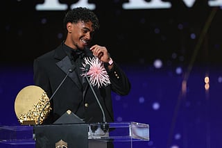 Spain and Barcelona forward Lamine Yamal speaks after winning the Trophy for the Men's Young Talent of the Year during the 2026 Ballon d'Or France Football award ceremony at the Palladium Theatre in London on October 26, 2026.
