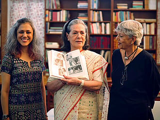 Congress chairperson Sonia Gandhi poses for a group picture with her upcoming book, ‘Belonging: A Journey of Love’, on Thursday. 