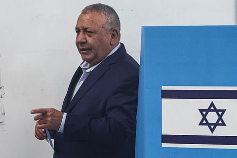 Yashar party leader Gadi Eisenkot prepares to cast his ballot at a polling station in Herzliya on October 27, 2026, on the day of Israel's legislative election.