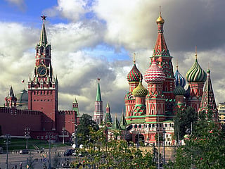 Spasskaya Tower, left, and St Basil's Cathedral in Moscow, Russia.