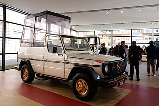 A popemobile used by successive popes is displayed at "A Century of the Popemobile," an exhibition tracing 100 years of papal transportation, from Pope Pius XI's first automobile in 1930 to modern popemobiles, at the Vatican Museums, Wednesday, Oct. 28, 2026. 