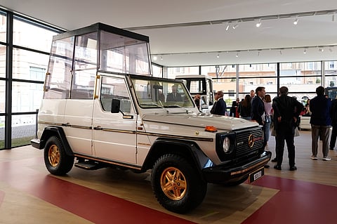 A popemobile used by successive popes is displayed at "A Century of the Popemobile," an exhibition tracing 100 years of papal transportation, from Pope Pius XI's first automobile in 1930 to modern popemobiles, at the Vatican Museums, Wednesday, Oct. 28, 2026. 