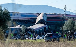 Emergency services attend to the victims at the scene of a collision between two trains in Urda, Spain, on Wednesday, Oct. 28, 2026. 