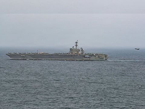 An F-35C Lightning II lands on the flight deck of USS George Washington (CVN 73) as the aircraft carrier continues operations in the Arabian Sea.