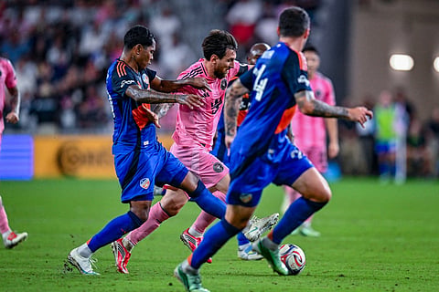 Inter Miami's Argentine forward #10 Lionel Messi (C) controls the ball against Cincinnati's Zimbabwean defender #15 Teenage Hadebe and Cincinnati's US defender #24 Kyle Smith during a Major League Soccer (MLS) regular season football match between Inter Miami CF and FC Cincinnati at Nu Stadium in Miami, Florida, on October 28, 2026.