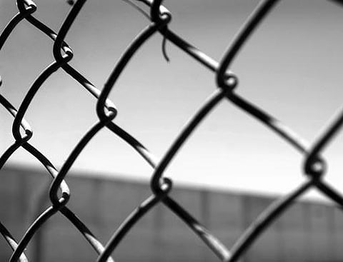 Four men get 10 years each for inmate rape