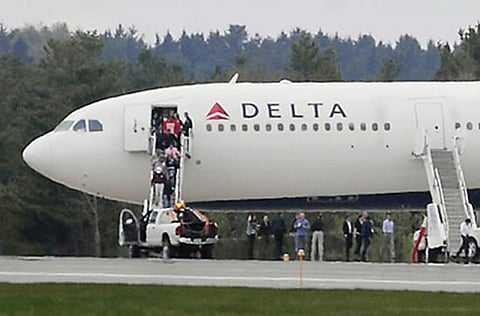 Delta Air Lines Inc. warned it would take a pretax accounting charge of $2 billion to $2.5 billion after deciding to remove three aircraft types from its fleet.