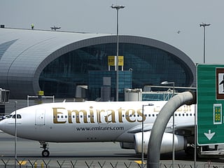 An Emirates flight taxis at the Dubai International Airport  in Dubai.  