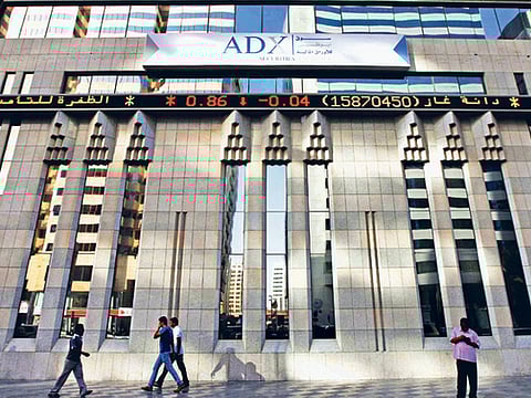 DFM declines, ADX gains