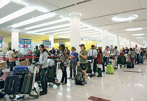 Emirates passengers at Dubai Airport’s Terminal 3. 