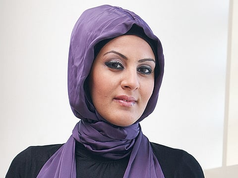 Simple purple hijab gives women a voice