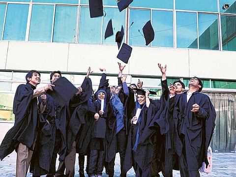 Kabul University’s graduate students celebrate their graduation during a ceremony in Kabul last year. The status of women in Afghanistan has changed in the last two decades.