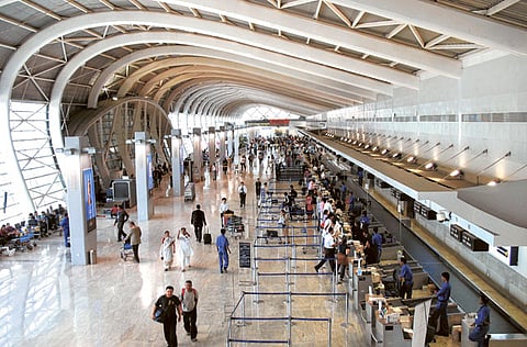 Passengers at Mumbai airport, one of India's international gateways. Current ticket rates are soaring.