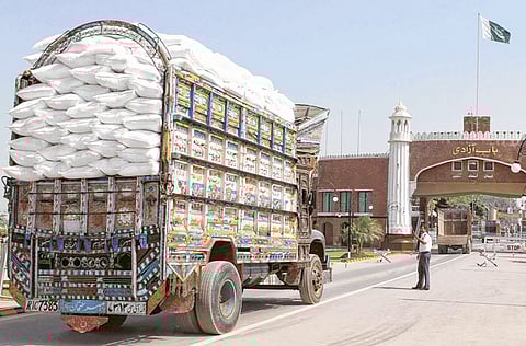 Trucks carrying Indian commodities for Pakistani traders arrive at the India-Pakistan Wagah border in April 2019.
