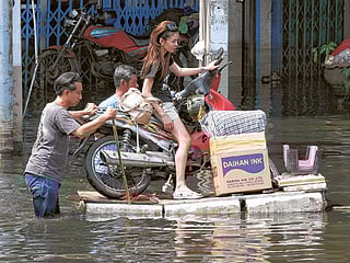 Floating garbage, sewage raise disease risk in Bangkok floods