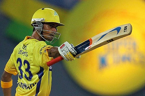 Chennai Super Kings' Subramaniam Badrinath celebrates after scoring half a century during an Indian Premier League (IPL) cricket match against Delhi Daredevils in Chennai, India.