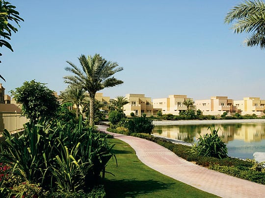 The Springs Dubai lake villas and landscaped walking path