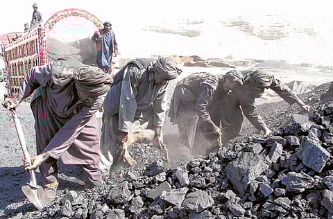 Miners work on a coal deposit in Soraj Ganj on the outskirts of Quetta, Pakistan. 