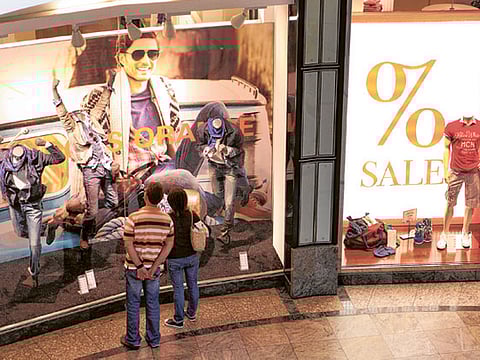 File picture of window shoppers in Oberhausen, Germany. Latest numbers indicate troubling times for the economy. 