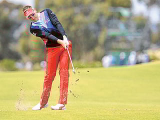Photos: Golf's most fashionable players dress to impress