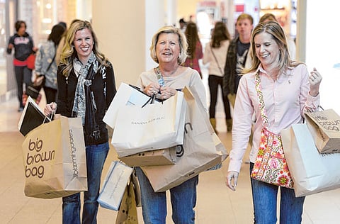 Shoppers at a mall at Lenox Square Mall in Atlanta, Georgia, USA.  In the first quarter of 2020 US economy shrank at a 4.8% annualized pace.