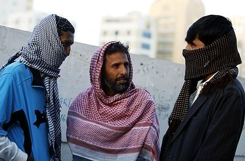 Workers are seen at Rolla Square in Sharjah early in the morning [Illustrative image]