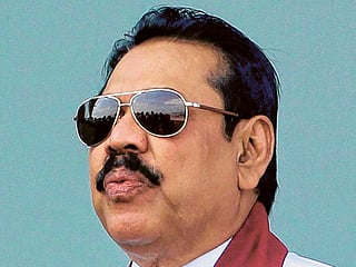 Rajapakse bows out, ending Sri Lanka power struggle