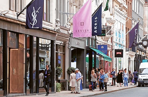 Shoppers on Old Bond Street in London. UK's luxury retailers fear a planned tax change related to Brexit could hurt business even more than Covid-19 lockdowns.