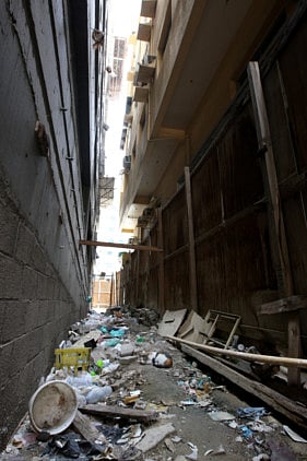 Unfinished parking lots turn into dumpsters