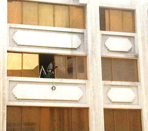 Residents put life at risk to clean windows