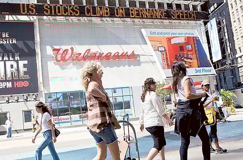 Shoppers at Times Square in New York. US Consumer spending rebounded a record 8.2 per cent in May as many states began lifting stay-at-home orders and businesses reopened, according to federal data released Friday.