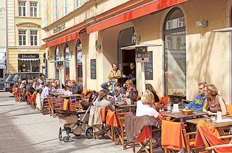 File picture of a cafe in Munich. Germany’s postwar economic model has always been export-led. 