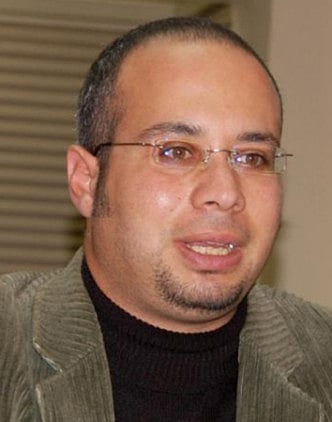 Egypt issues warrants for pro-democracy activists