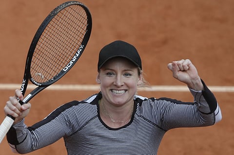 Bethanie Mattek-Sands celebrates defeating Li Na in their second round match at the French Open on Thursday.
