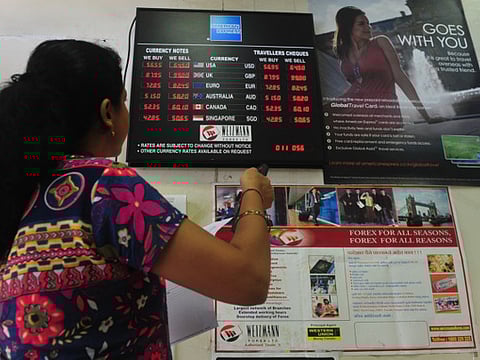 A currency exchange in Mumbai. Indian rupee strengthened 43 paise to end at 73.39  against the US dollar on Friday supported by persistent foreign fund inflows and weak American currency.