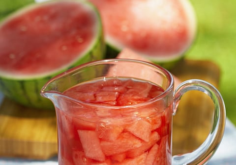 A pitcher of watermelon agua fresca
