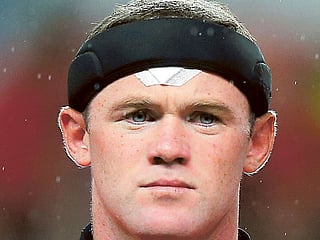 Sir Alex Ferguson heaps praise on Wayne Rooney in bid to build bridges
