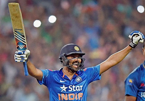 India's Rohit Sharma celebrates his knock.