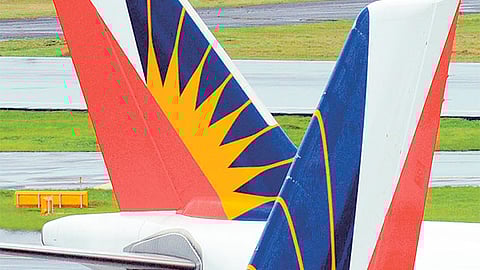 Philippine Airlines planes taxi at Manila’s international airport. China Communications Construction Co and its local partner have won an auction for a $10 billion airport on the outskirts of Manila