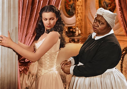 IVivien Leigh appears in character as Scarlett O'Hara, left, and Hattie McDaniel as Mammy, in the film, "Gone with the Wind." 