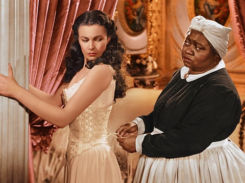 IVivien Leigh appears in character as Scarlett O'Hara, left, and Hattie McDaniel as Mammy, in the film, "Gone with the Wind." 