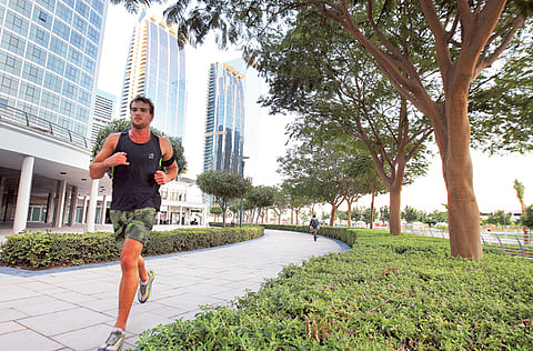 PICTURE FOR ILLUSTRATIVE PURPOSE ONLY
A jogger runs at Jumeirah Lake Towers (JLT) area in Dubai.
