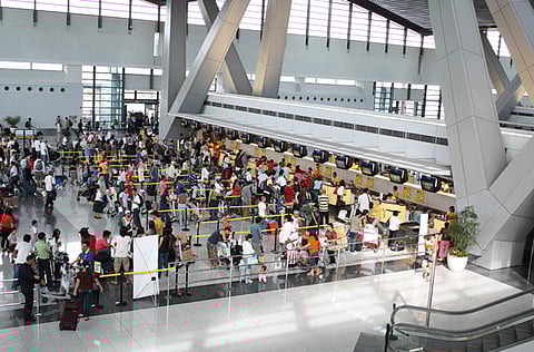 Manila airport's Terminal 3. Overseas Filipino workers going to their workplaces abroad