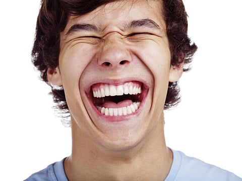 Smile, and happiness will follow