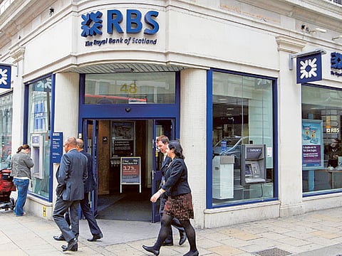 RBS plots retreat from Irish losses as British poll looms