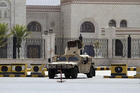 A military vehicle is stationed outside the al-Saleh mosque in Sanaa (File)