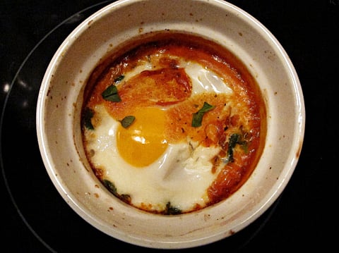Ramadan recipe: Noura’s baked eggs with tomato