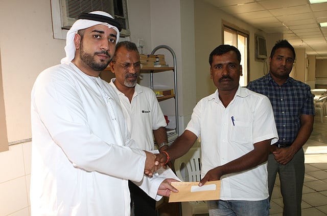 Dubai labourers' children receive school fund