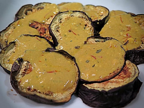 Roasted aubergine, saffron yogurt and pomegranate molasses