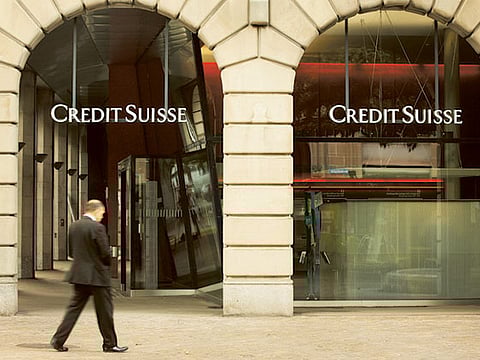 Credit Suisse exits commodities trading, trims investment bank